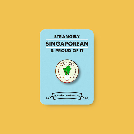 Strangely Singaporean Pin – Chin Cai