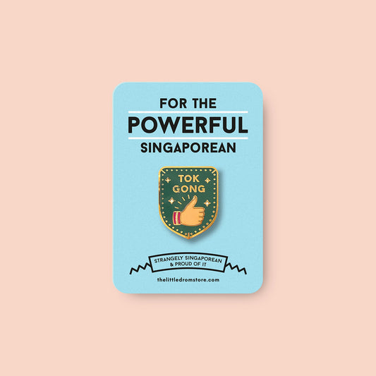 Strangely Singaporean Pin – Tok Gong