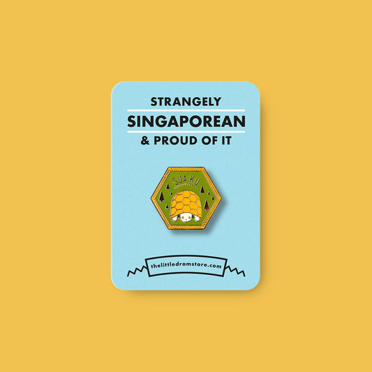 Strangely Singaporean Pin – Suaku