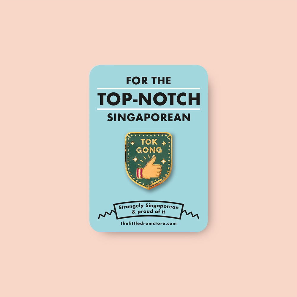 Strangely Singaporean Pin – Tok Gong